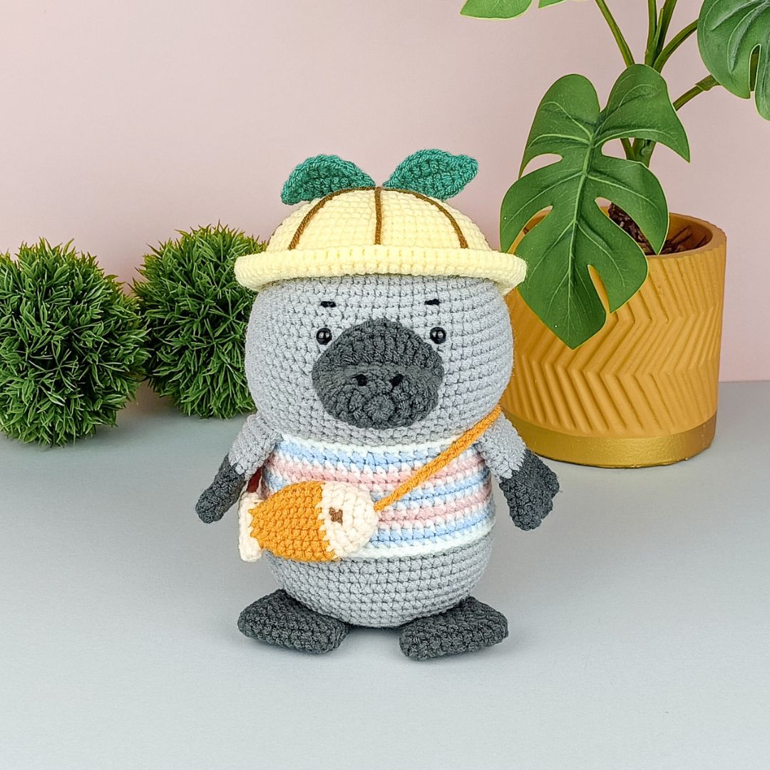 Cute greyish platypus amigurumi