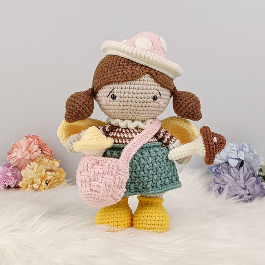 Crochet fairy doll with yellow wings