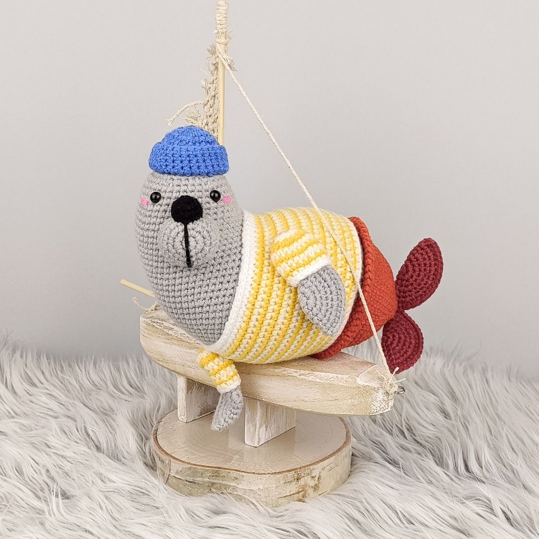 Cute crochet seal with blue hat