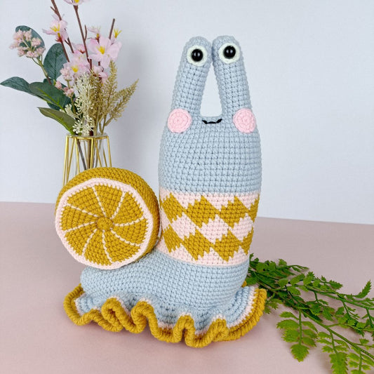 Cute colourful crochet snail