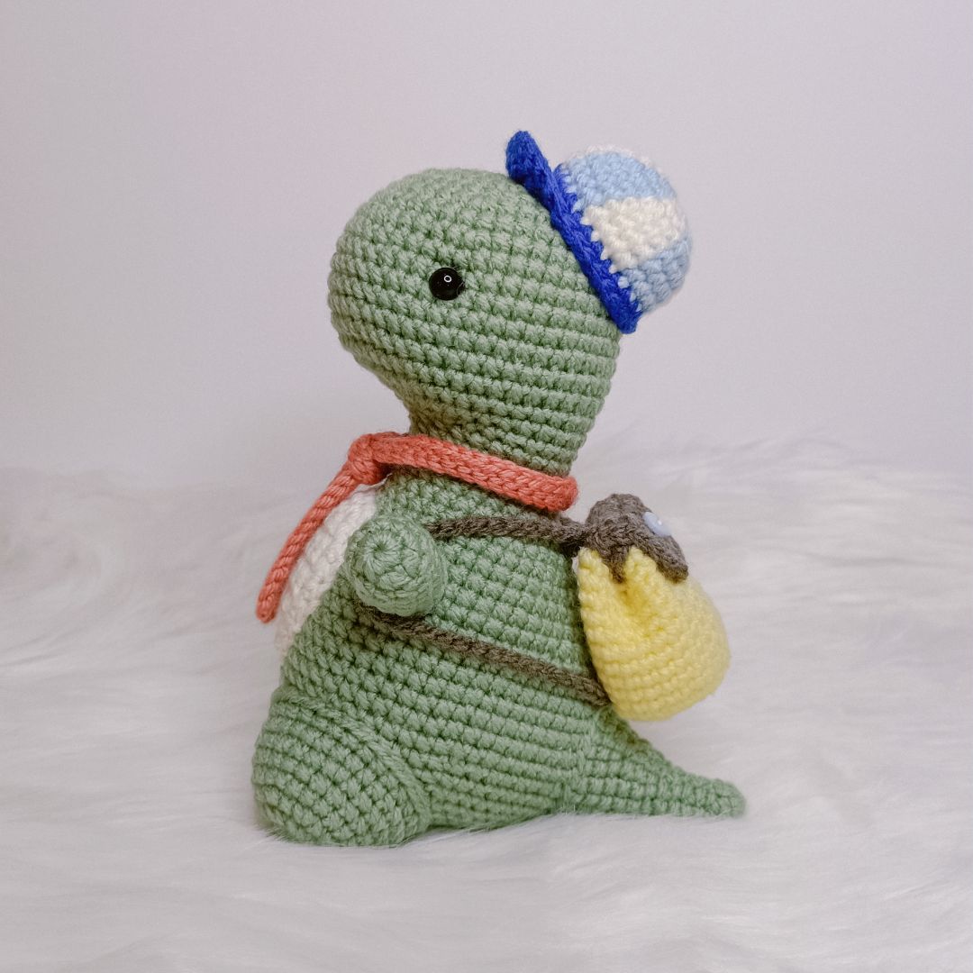 Crochet cute T-rex Dinosaur going to school.