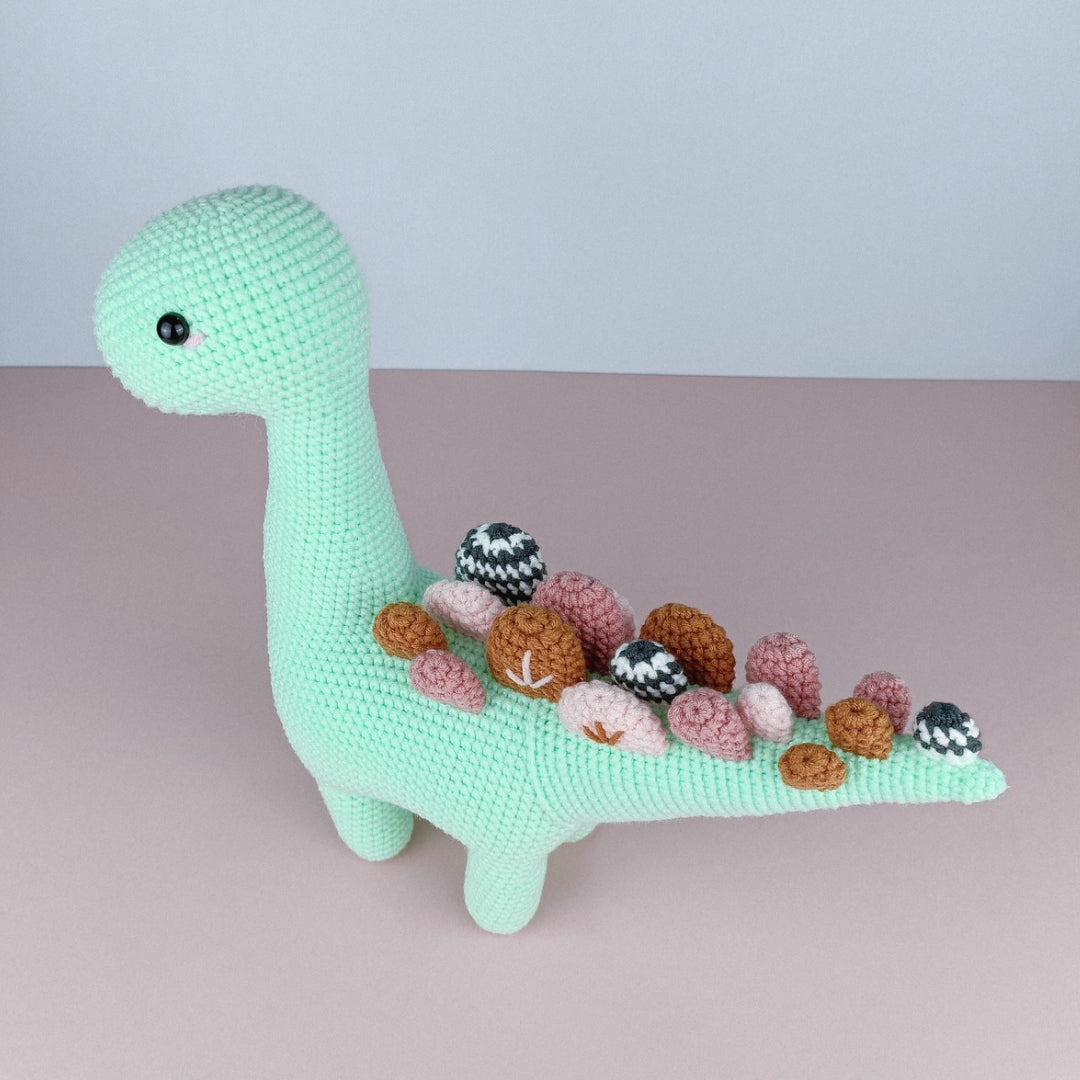 Crochet dinosaur with beautiful long tail